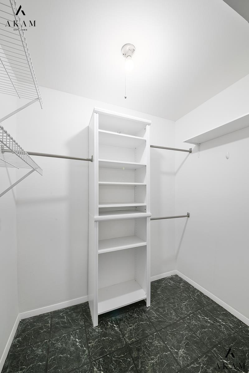 211 Thompson Street, Unit 4C Manhattan, NY 10012 - Photo 13 of 15 a view of walk in closet with empty racks