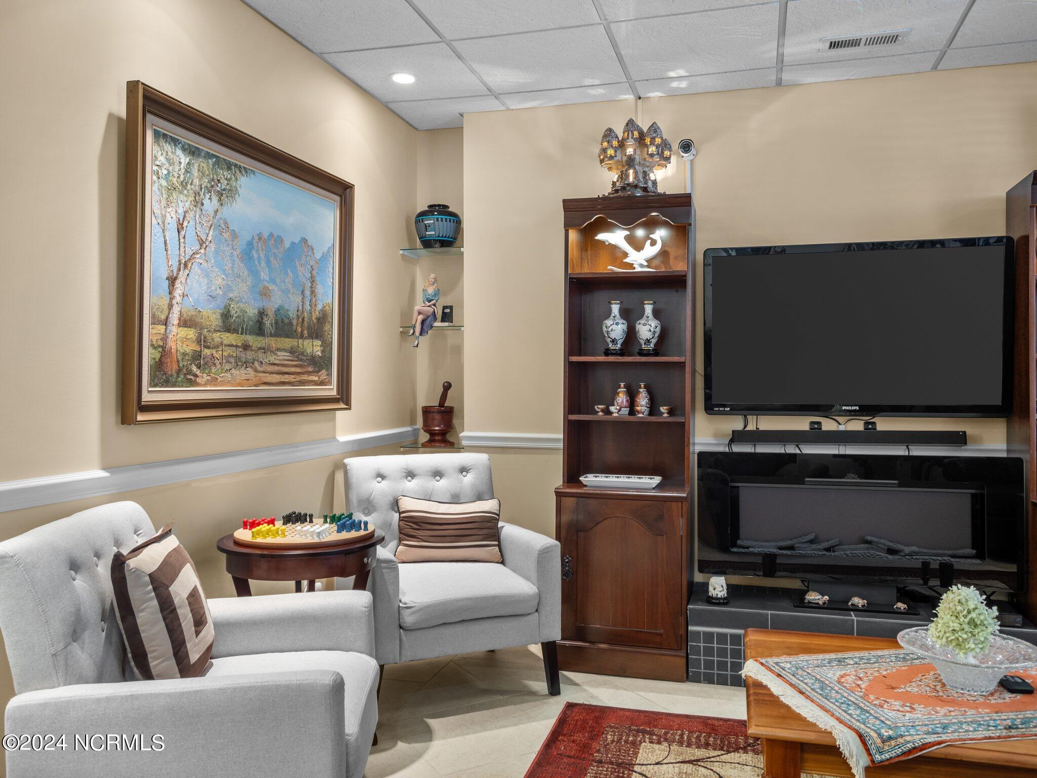 2000 New River Inlet Road, Unit 1004 North Topsail Beach, NC 28460 - Photo 34 of 48 Living room
