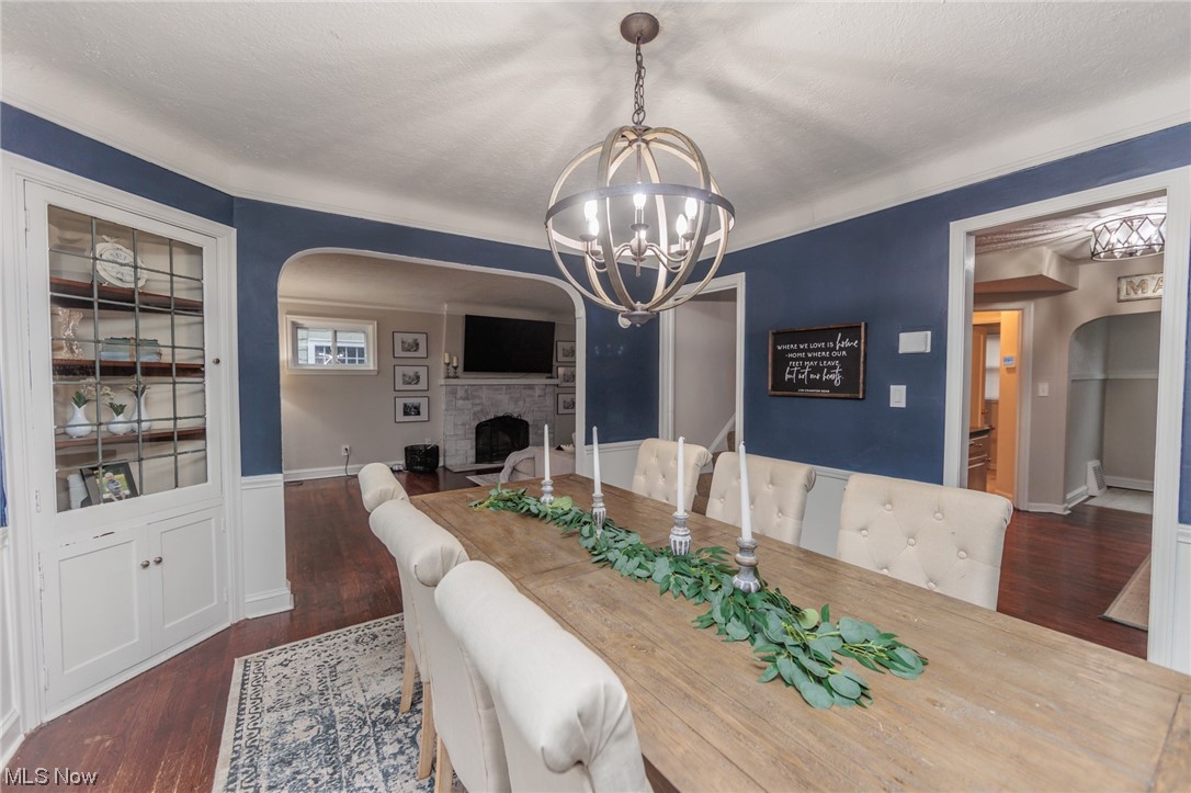 2199 Cranston Road Cleveland, OH 44118 - Photo 13 of 40 Dining space featuring dark wood-type flooring and a chandelier