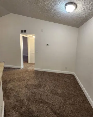 an empty room with window