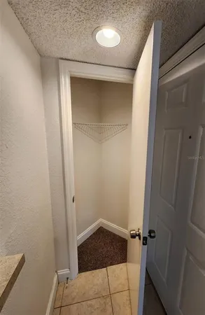 a bathroom with a shower and a sink