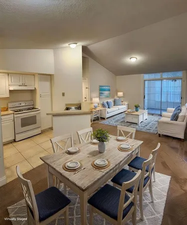 a view of a dining room with furniture