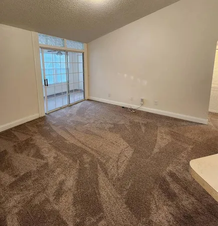 en empty room with windows