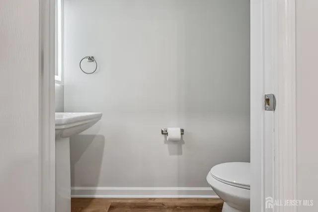 a bathroom with a toilet and a bathtub