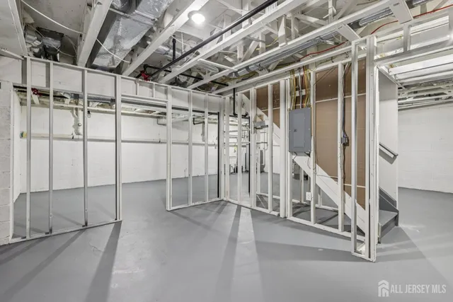 a picture of a bench in a white wall