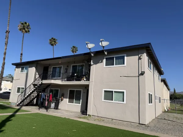 a view of a back yard of the house