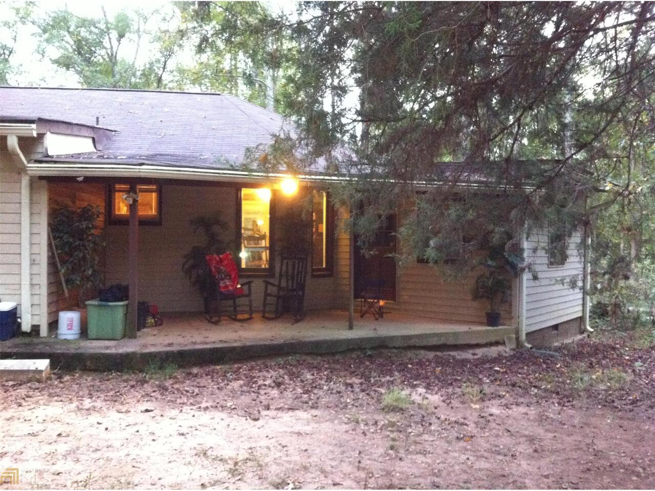 2226 Randolph Still Road Good Hope, GA 30641 - Photo 1 of 1 a view of a house with backyard