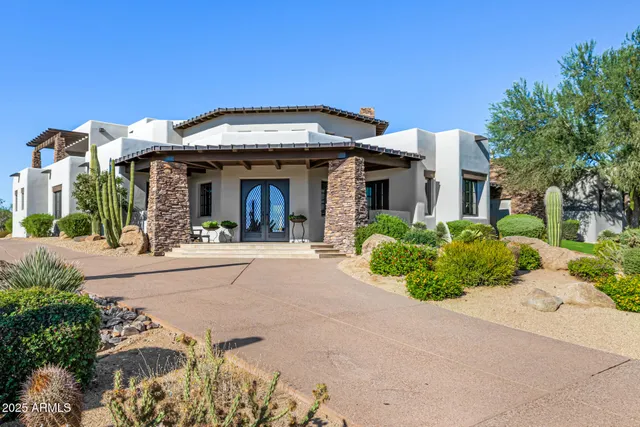 a view of a building with a garden