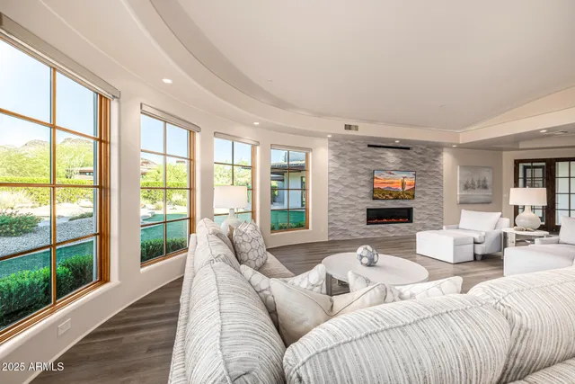 a bedroom with a bed and a night stand