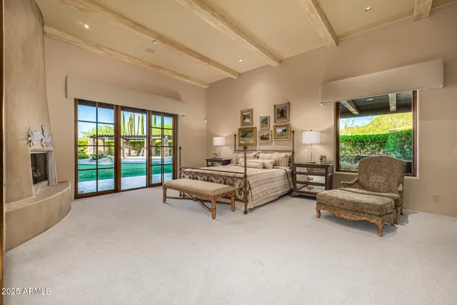 a bedroom with a bed and a couch