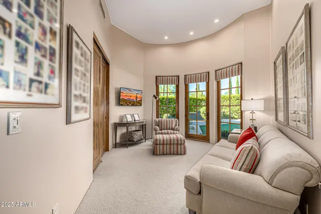 a view of house with backyard and outdoor seating