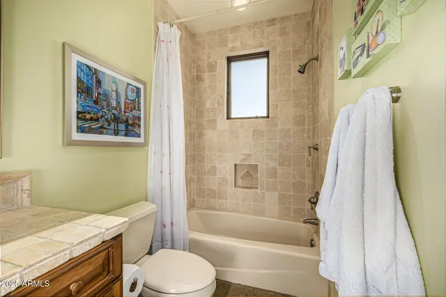 a view of an house with backyard and outdoor seating