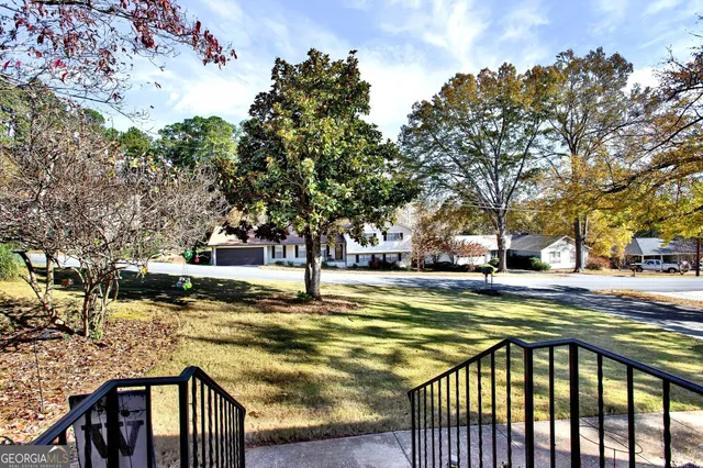 a view of a swimming pool with a patio