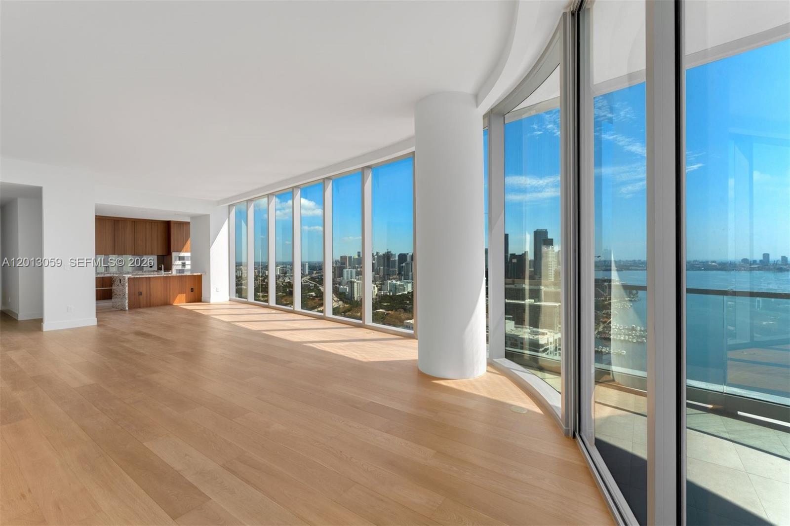 175 Southeast 25th Road, Unit 3601 Miami, FL 33129 - Photo 6 of 27 a view of empty room with floor to ceiling window