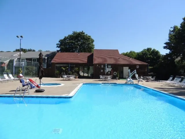 a view of pool with outdoor seating