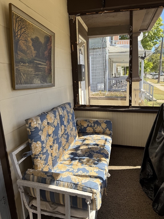 82-84 Maryland Street Springfield, MA 01108 - Photo 11 of 12 a view of a dining room with furniture and a large window