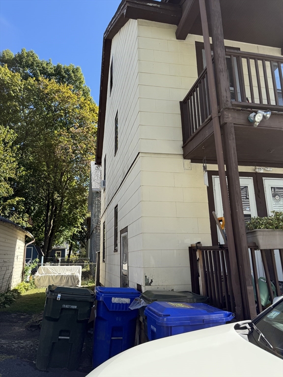 82-84 Maryland Street Springfield, MA 01108 - Photo 6 of 12 a view of balcony with wooden floor and outdoor seating