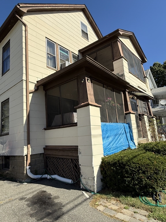 82-84 Maryland Street Springfield, MA 01108 - Photo 8 of 12 a view of a house with a yard
