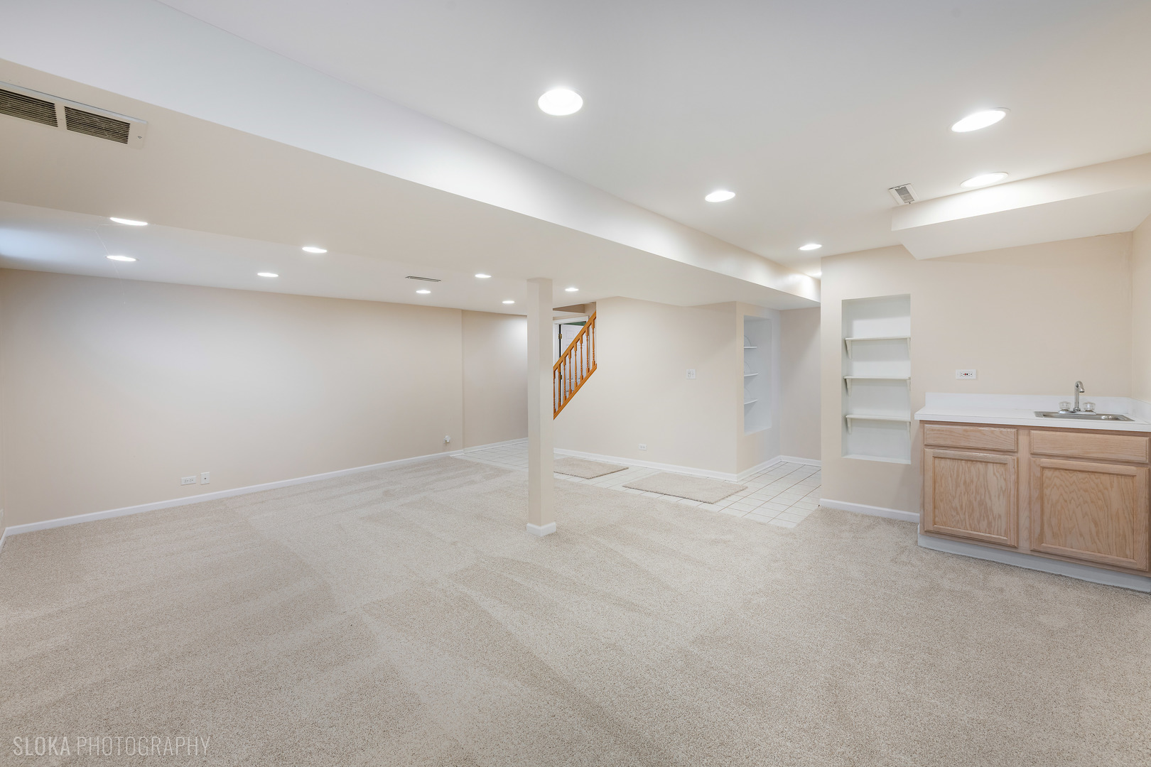 508 Crest Drive Cary, IL 60013 - Photo 25 of 35 a view of an empty room with a kitchen
