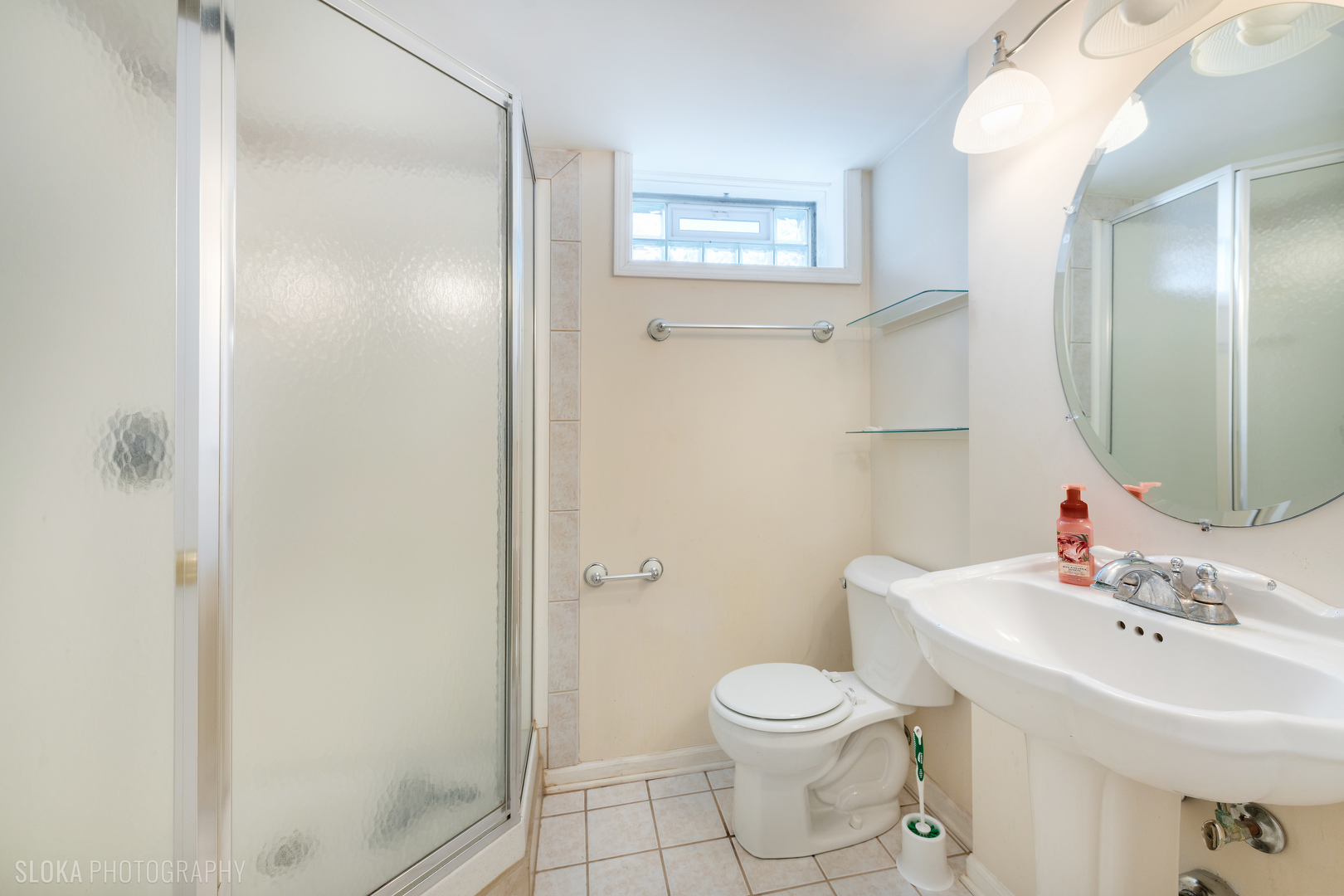 508 Crest Drive Cary, IL 60013 - Photo 26 of 35 a bathroom with a toilet sink and shower