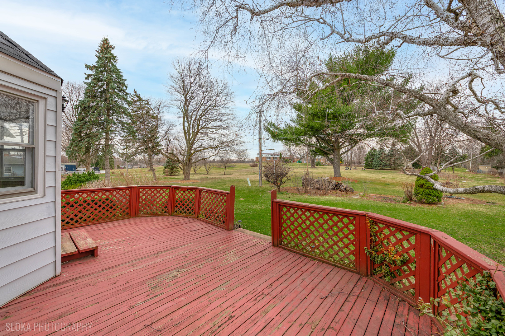 508 Crest Drive Cary, IL 60013 - Photo 31 of 35 a view of a wooden deck with a yard