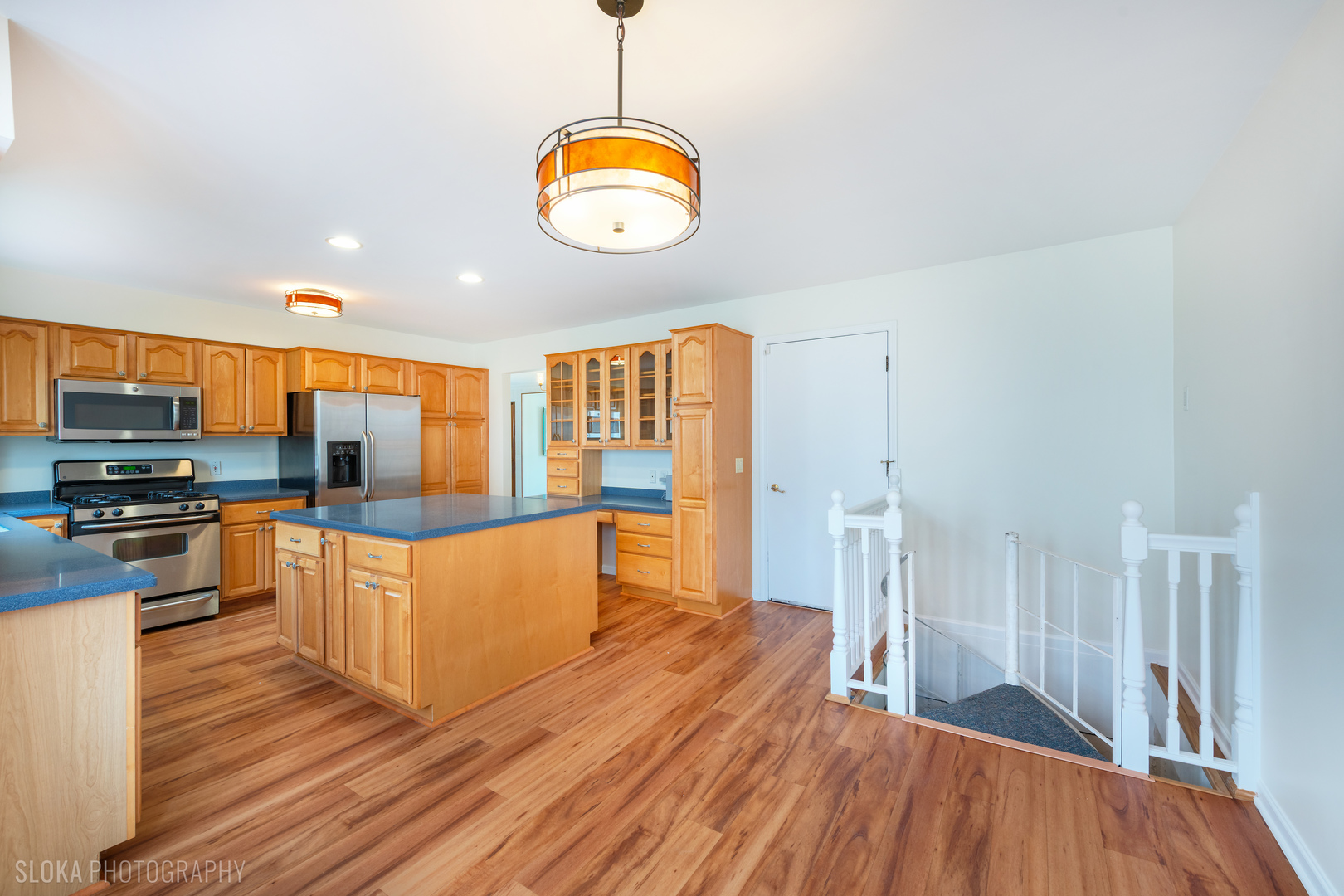 508 Crest Drive Cary, IL 60013 - Photo 10 of 35 a large kitchen with lots of counter space and stainless steel appliances