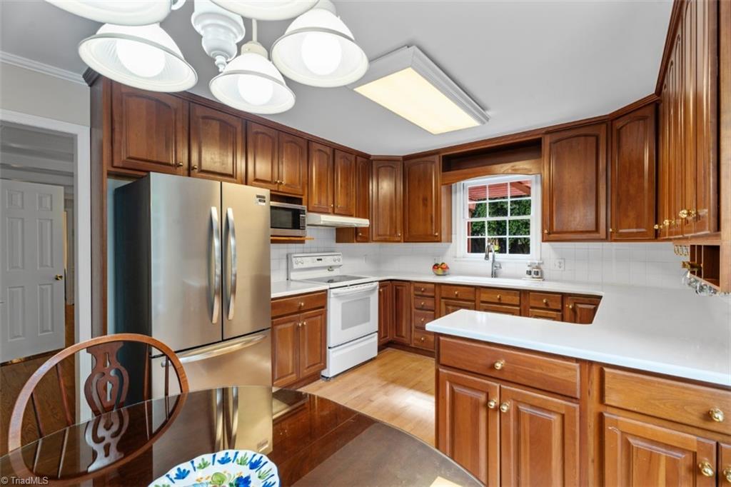 262 Stanaford Road Winston-Salem, NC 27104 - Photo 15 of 47 Kitchen with quartz counters and porcelain farmhouse sink