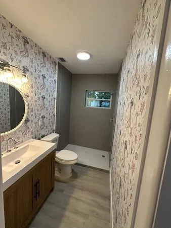 a bedroom with bed and window