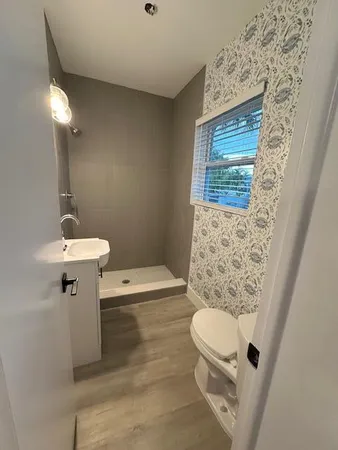 a view of a lounge chairs in a patio