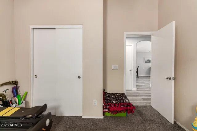 a view of room with window and furniture