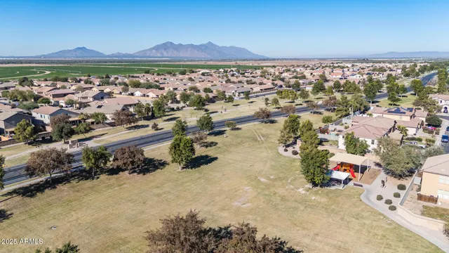 a view of a street with an ocean view