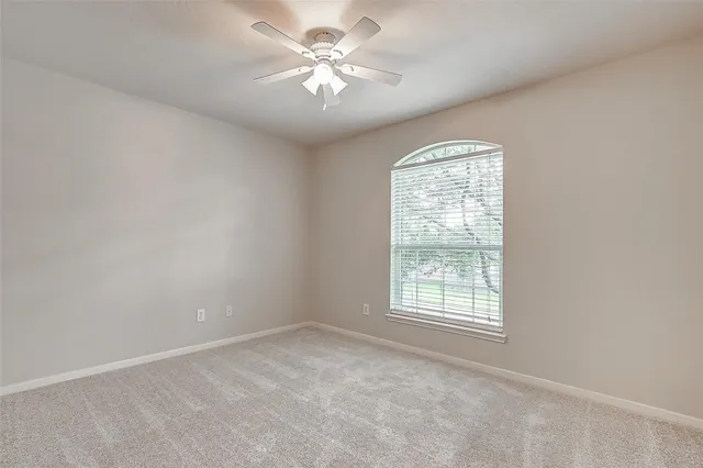 a view of a hallway with staircase