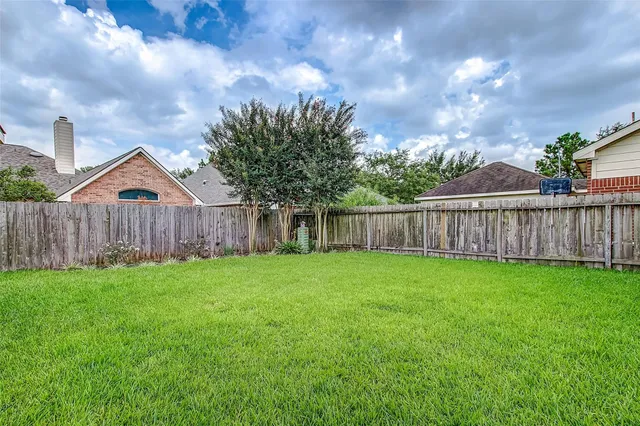a view of a backyard with a garden