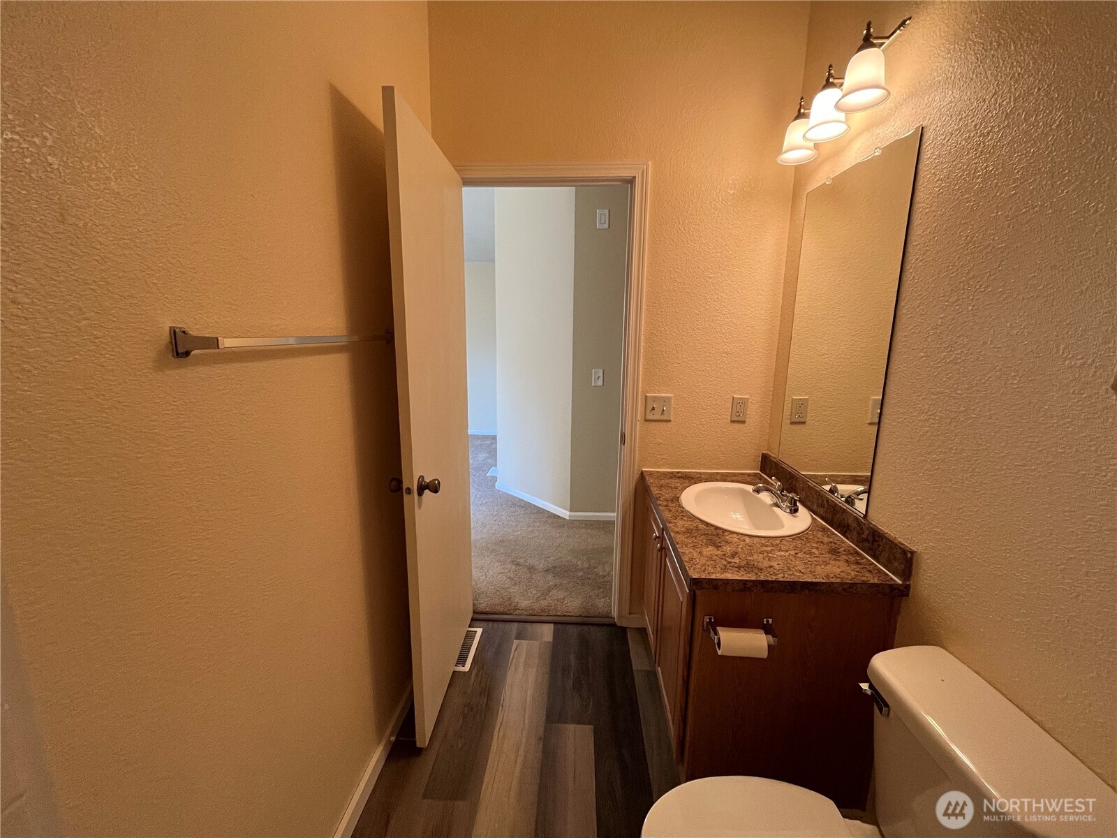 920 Castle Avenue Winthrop, WA 98862 - Photo 16 of 40 a bathroom with a granite countertop sink toilet and shower