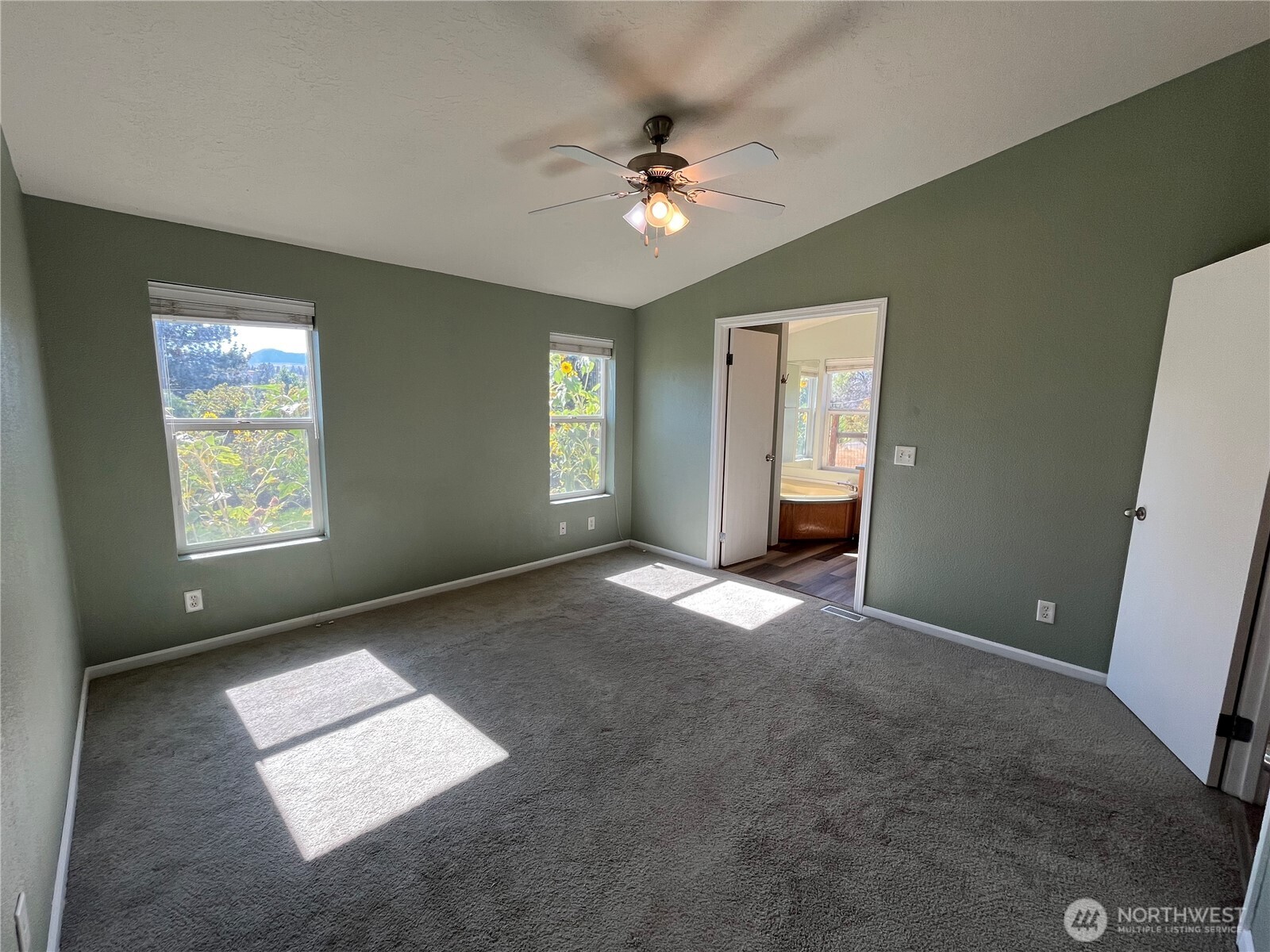 920 Castle Avenue Winthrop, WA 98862 - Photo 27 of 40 a view of livingroom with window and ceiling fan