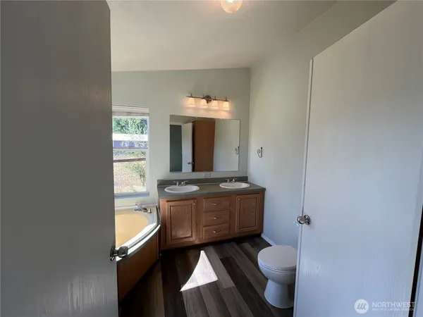 a view of balcony with wooden floor