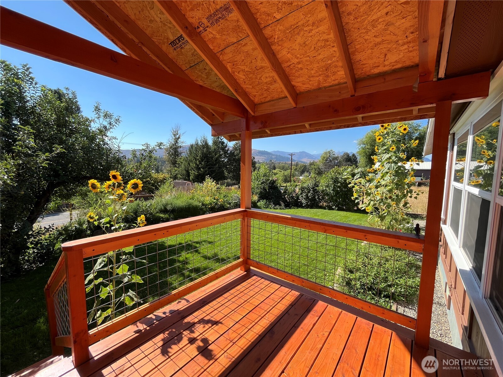 920 Castle Avenue Winthrop, WA 98862 - Photo 33 of 40 a view of balcony with wooden floor