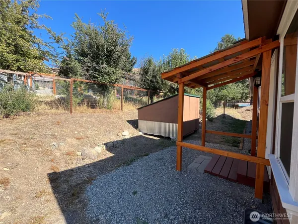 a view of a yard with an outdoor space