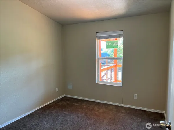 an empty room with a door