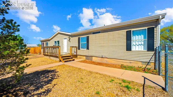 a view of a house with a patio