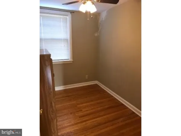 a view of a hallway with entryway