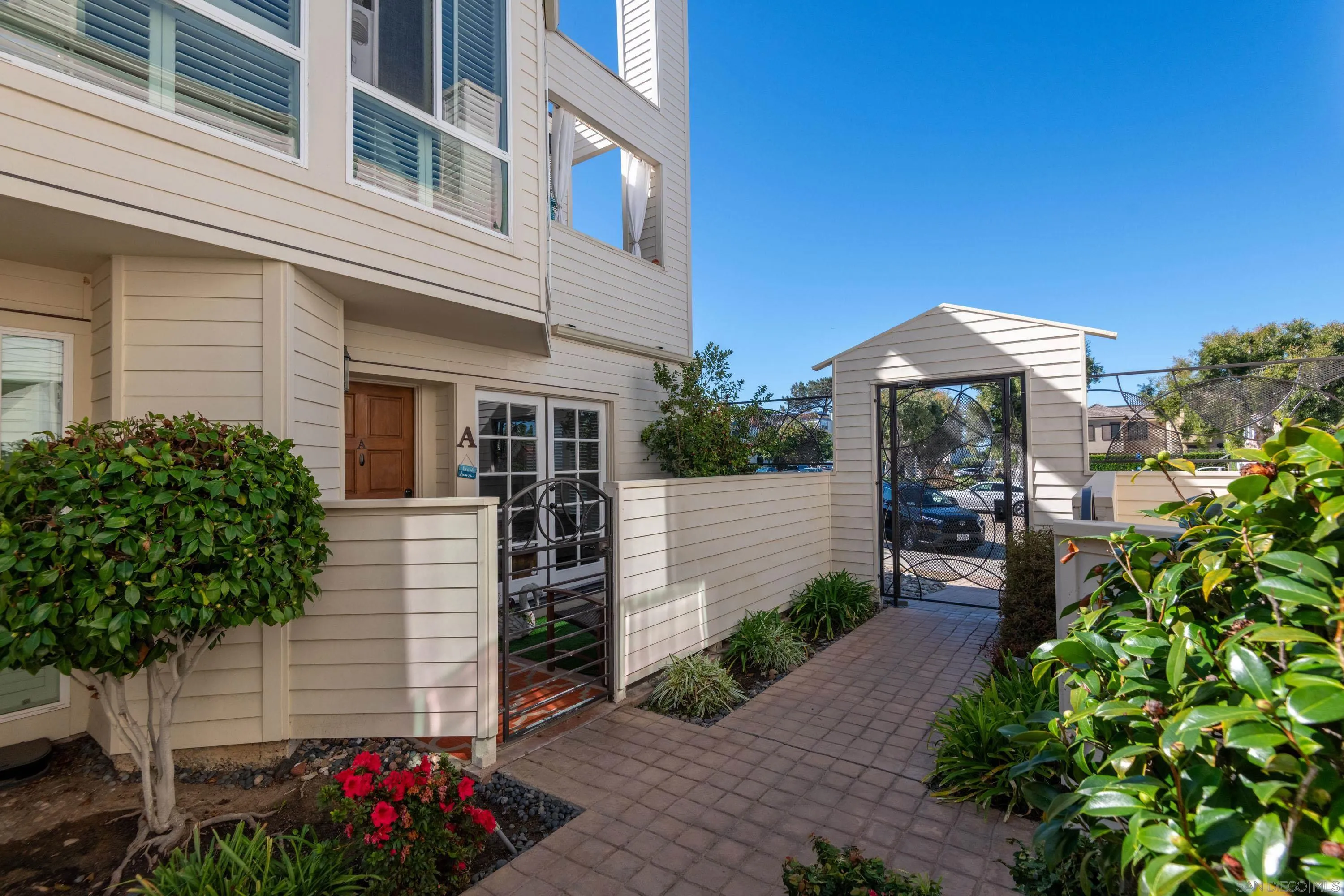 7585 Eads Avenue, Unit A La Jolla, CA 92037 - Photo 19 of 33 a front view of a house with plants