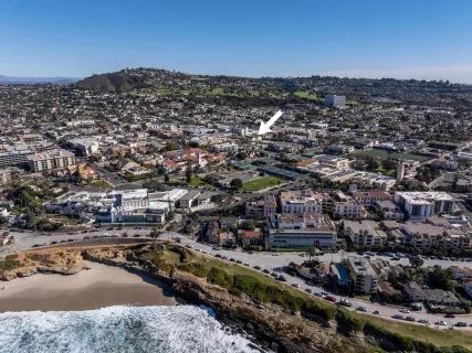 an aerial view of house with yard