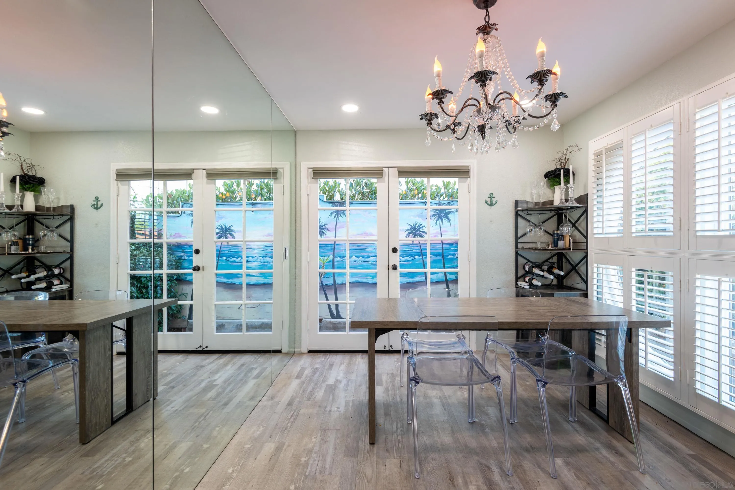 7585 Eads Avenue, Unit A La Jolla, CA 92037 - Photo 7 of 33 a view of a dining room with furniture window and wooden floor