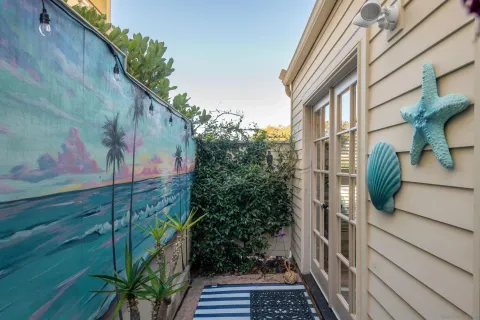 a view of a house with a street