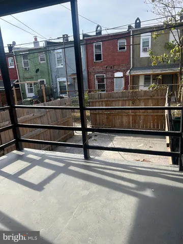 a view of a building from a balcony