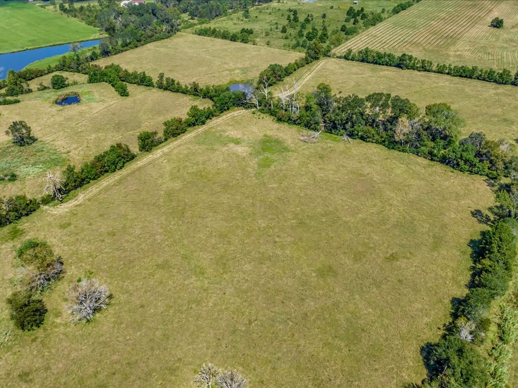 655 Sam Baird Road Lufkin, TX 75901 - Photo 12 of 15 an aerial view of residential houses with outdoor space