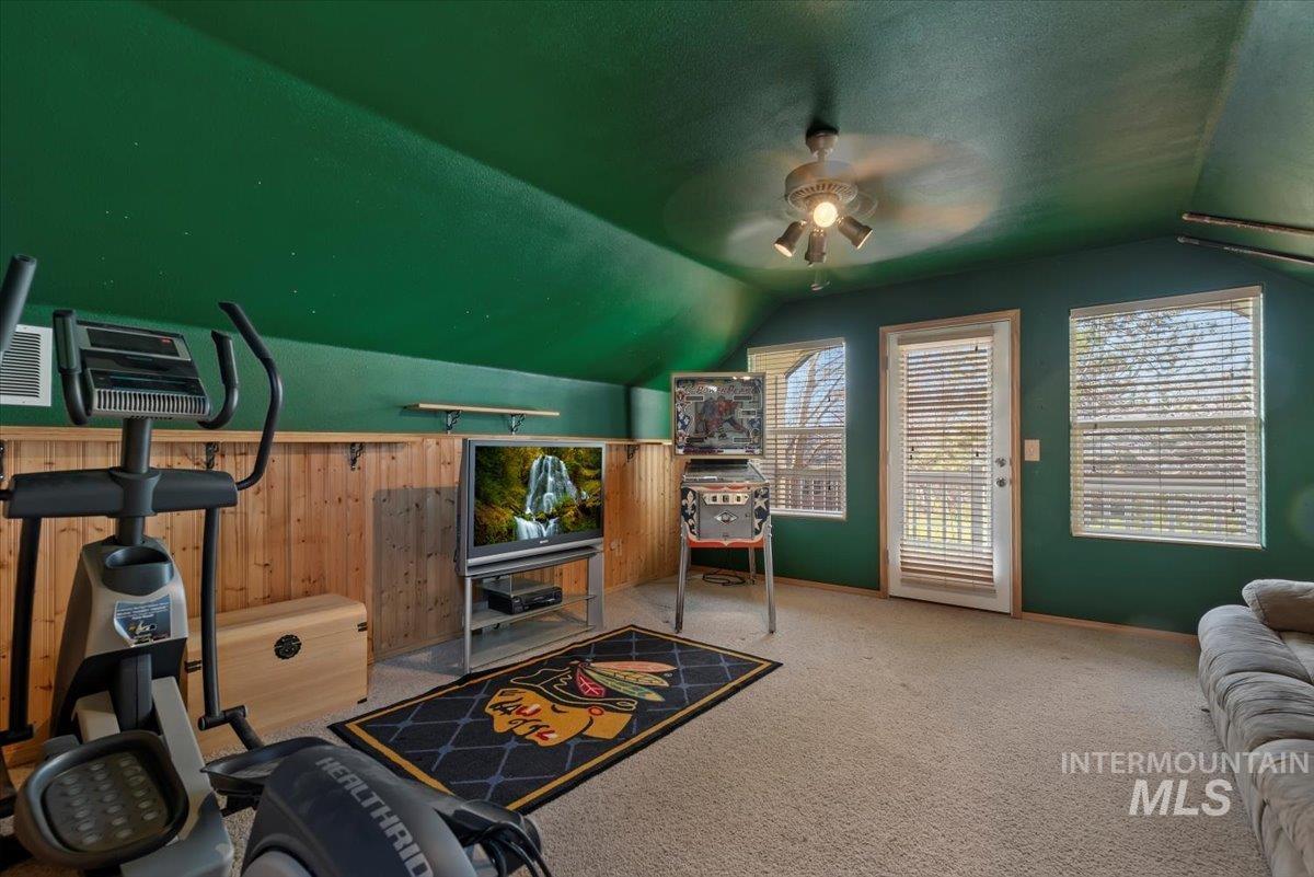 4167 North Arches Way Meridian, ID 83646 - Photo 23 of 36 featuring vaulted ceiling, carpet, and a ceiling fan