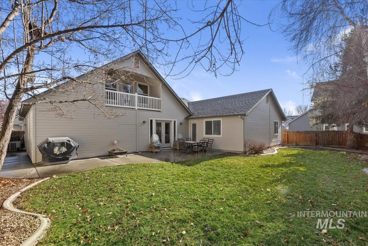 4167 North Arches Way Meridian, ID 83646 - Photo 30 of 36 Back of house with a patio, a balcony, french doors, and outdoor dining space