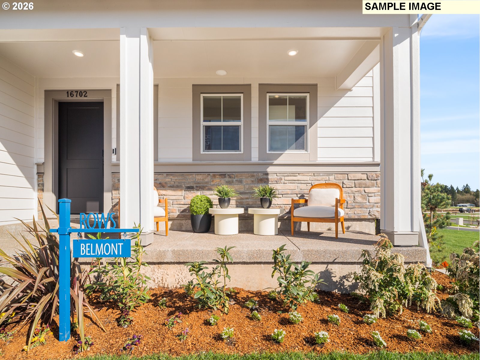 18218 Southwest Tippery Lane Beaverton, OR 97003 - Photo 3 of 21 a building outdoor space with patio furniture and potted plants